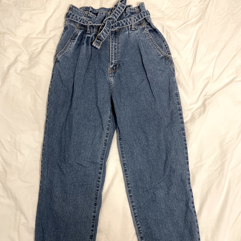 Paper bag Abercrombie jeans.